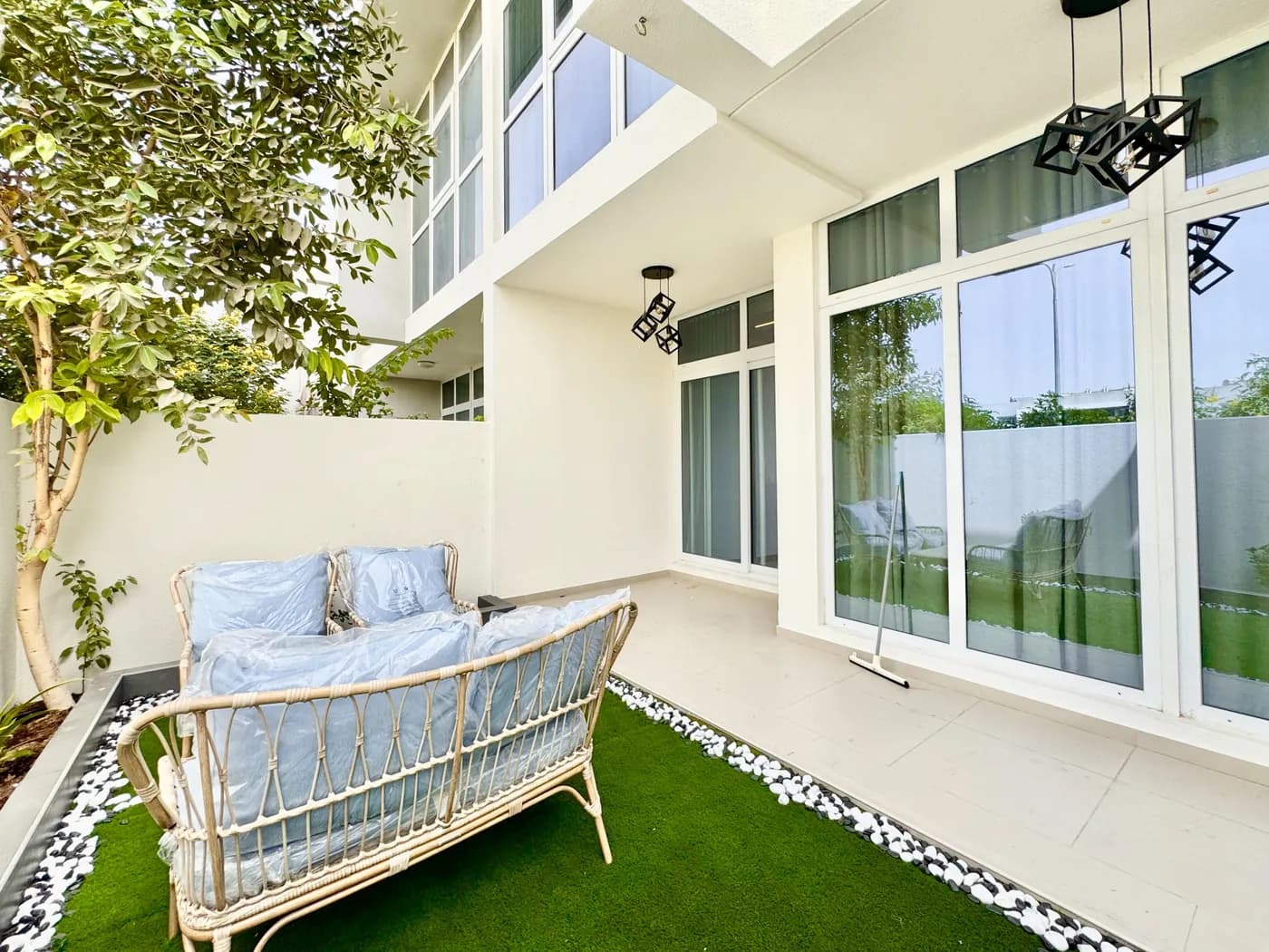 Garden terrace of a Damac Hills 2 townhouse listed with Al Ranim Properties