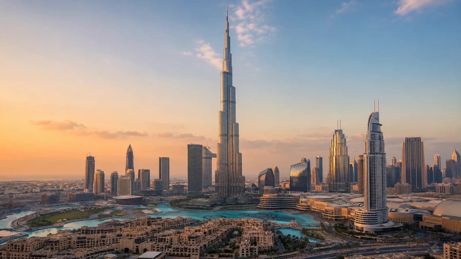 Burj Khalifa and the Downtown Dubai skyline at calm dawn